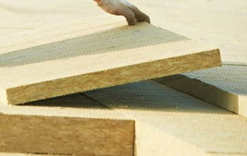 measuring Upper Walthamstow tapered insulation